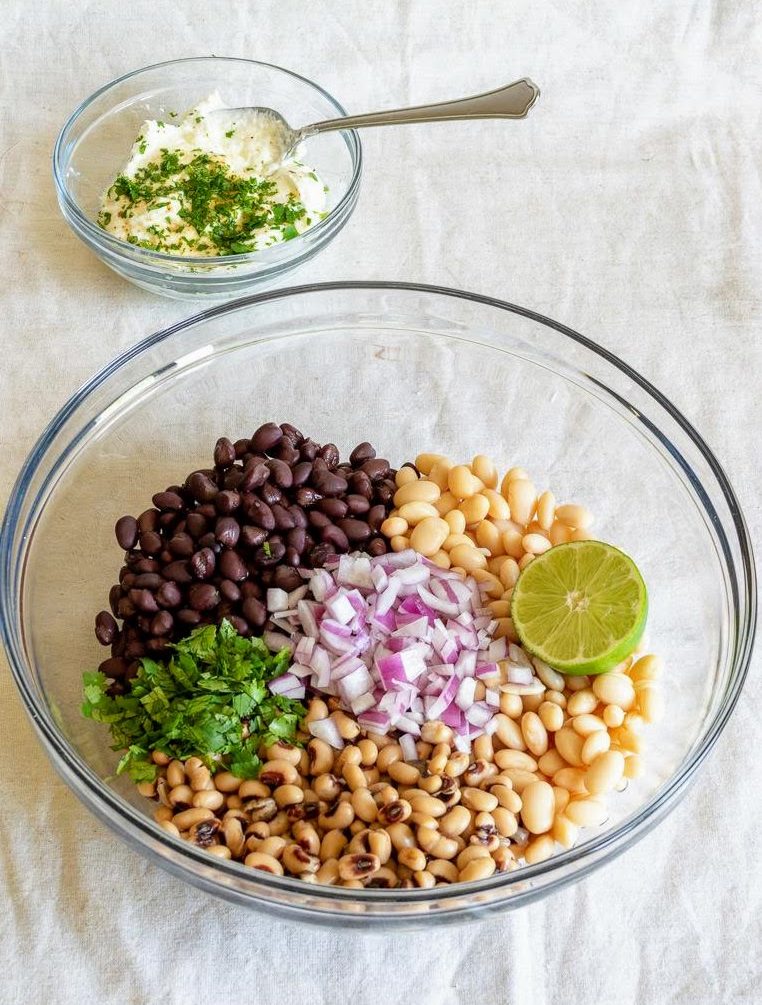Ingredients for three bean salad in a bowl.